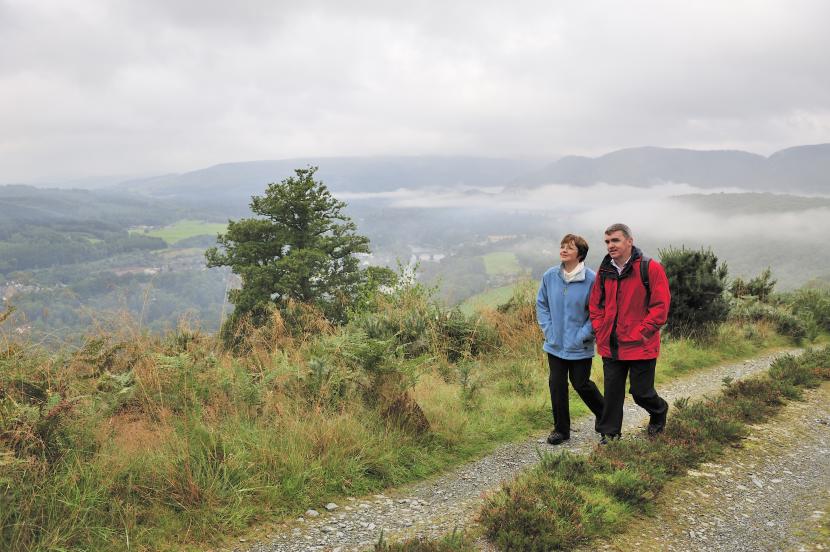 People walking on a track near Dunkeld, Tayside 