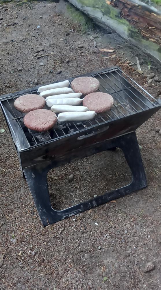 A BBQ stand on a hard surface