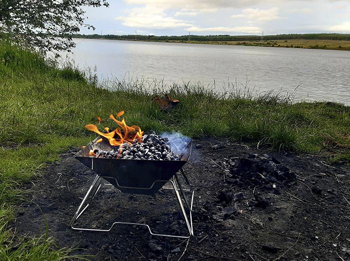 Fire in fire bowl and raised from the ground