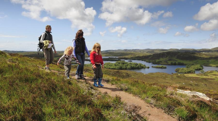 Homepage Background 1 People walking on a hill