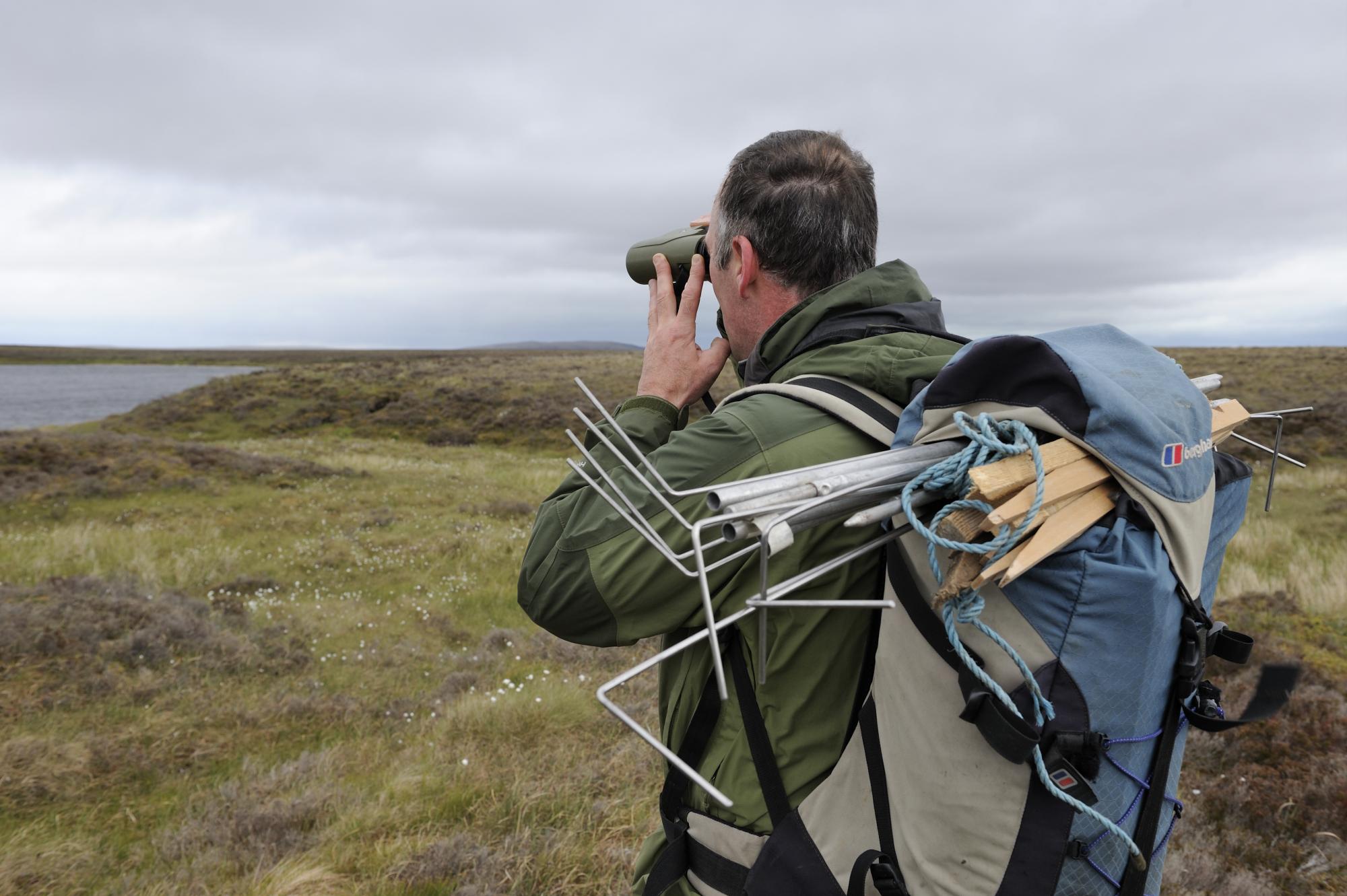 Norrie Russell, Forsinard Flows RSPB Site Manager checking for black throated divers. ©Lorne Gill/SNH/2020VISION. For information on reproduction rights contact the Scottish Natural Heritage Image Library on Tel. 01738 444177 or www.nature.scot