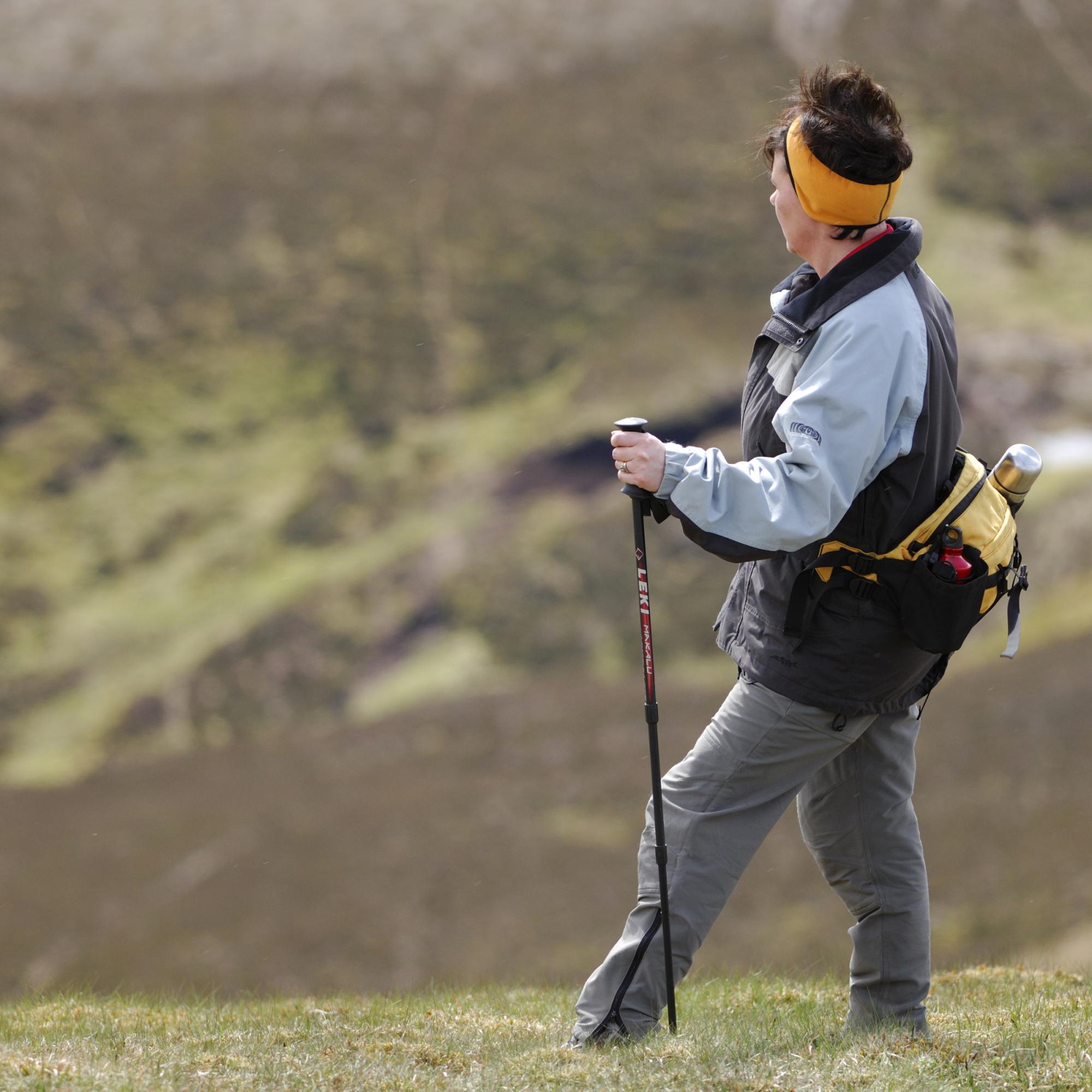 Hiker looking down a mountain