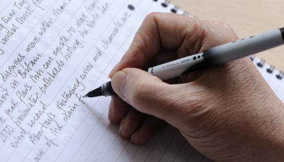 Person writing notes in a notebook. ©Lorne Gill/SNH. For information on reproduction rights contact the Scottish Natural Heritage Image Library on Tel. 01738 444177 or www.nature.scot Thumbnail