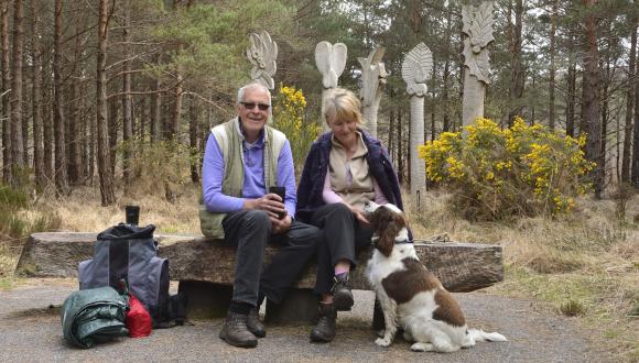 Visitors and their dog resting at a seated area on the visitor centre trail at Beinn Eighe National Nature Reserve, April 2015. ©Lorne Gill/SNH For information on reproduction rights contact the Scottish Natural Heritage Image Library on Tel. 01738 44417 Thumbnail