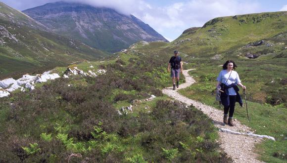 Man and a woman walking on an upland footpath. ©Lorne Gill/SNH. For information on reproduction rights contact the Scottish Natural Heritage Image Library on Tel. 01738 444177 or www.nature.scot Thumbnail